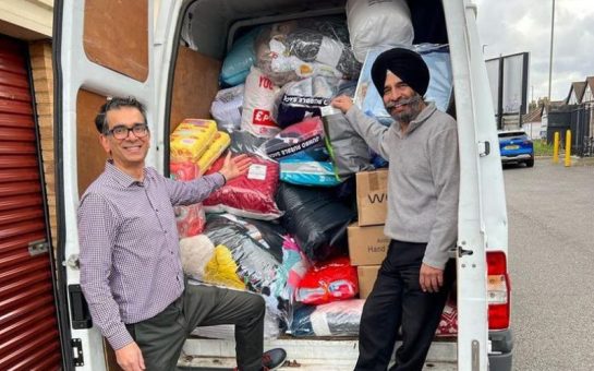 Redbridge Council Leader in a van with donations