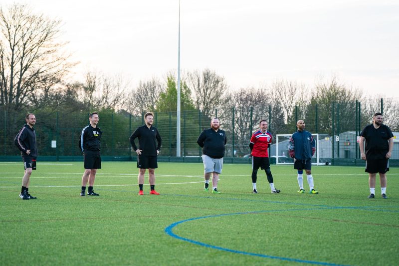 men playing football