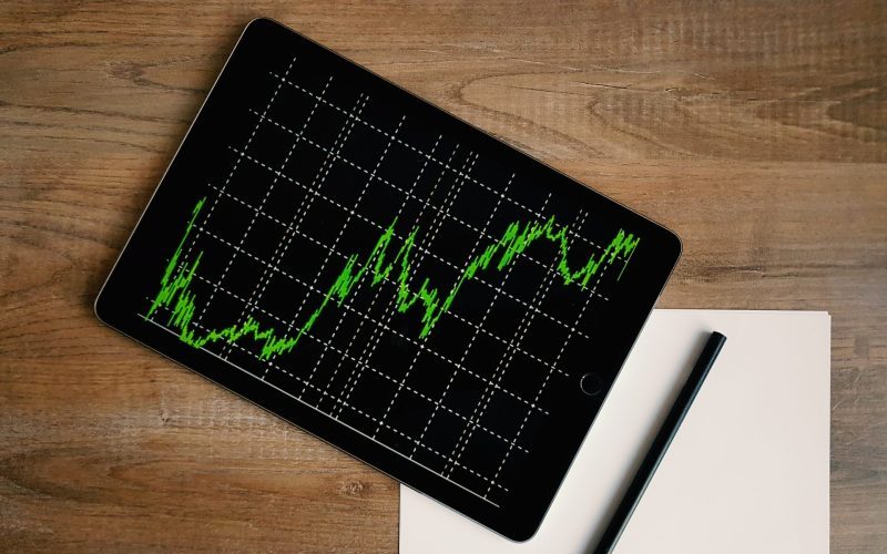 Tablet with a graph of stocks on it