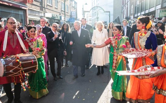 King Charles and Queen Consort Camilla walking down Brick Lane during the February 2023 Brick Lane Festival