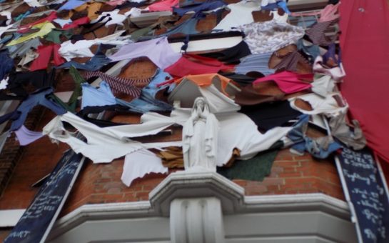 Shadwell convent statue framed by squatters mural prior to being evicted