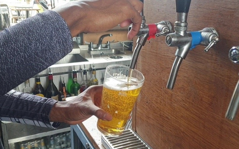 Beer being poured at brewery taproom