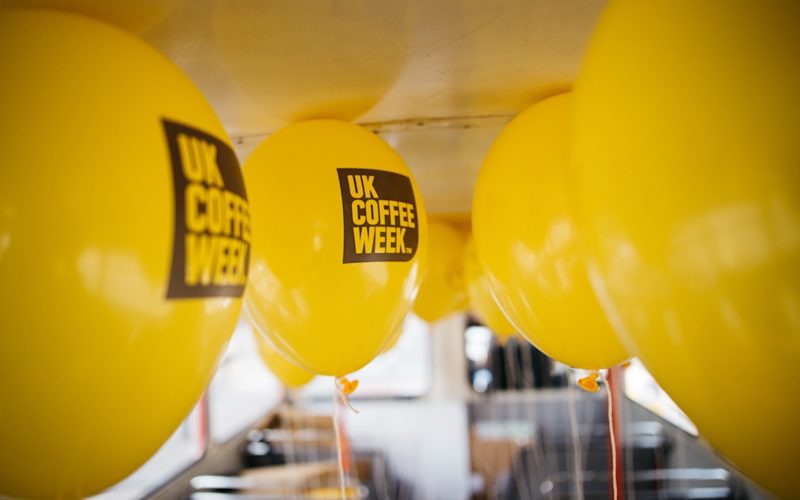 Picture of yellow balloons that say UK Coffee Week.