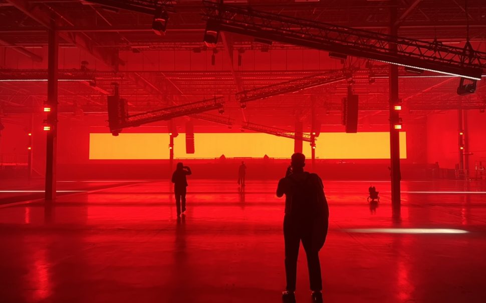 Large club dancefloor bathed in red light