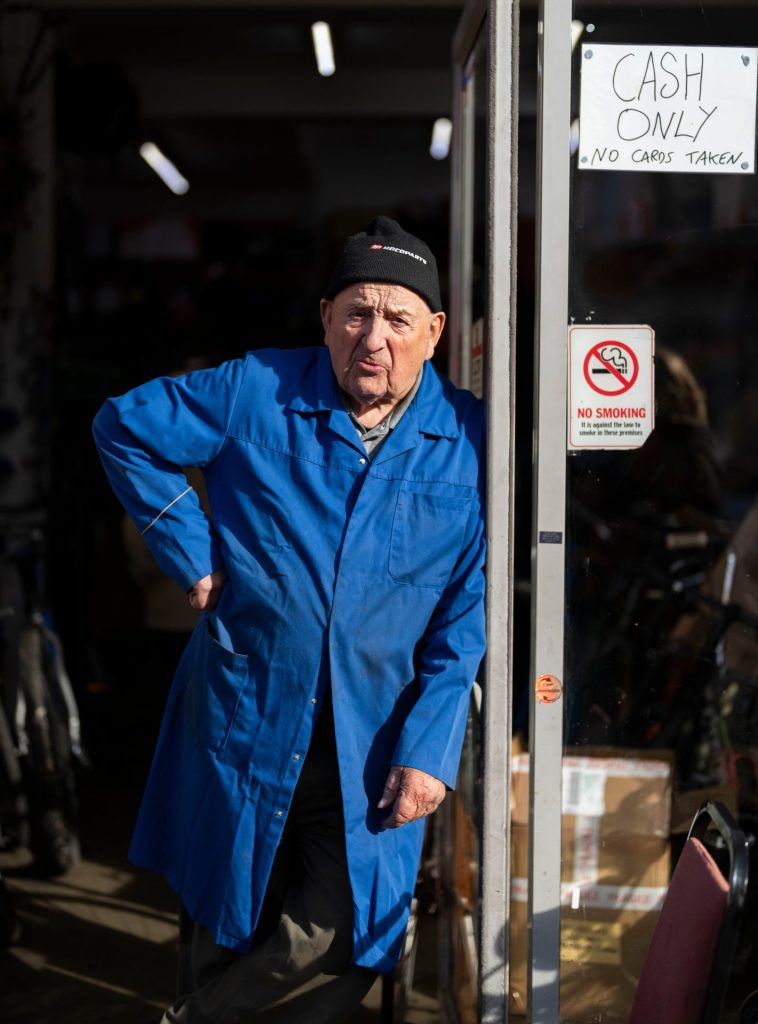 Etty outside his Forest Gate cycling repair shop