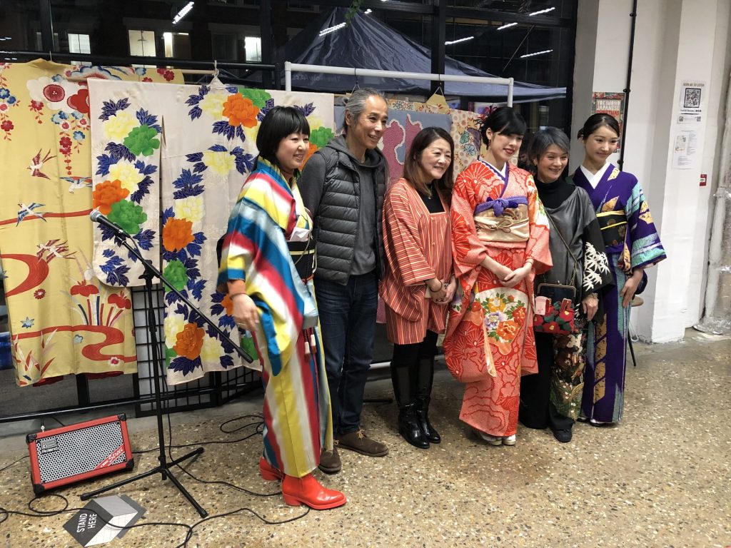 Sugawara with other organisers and Japanese models presenting kimonos.
