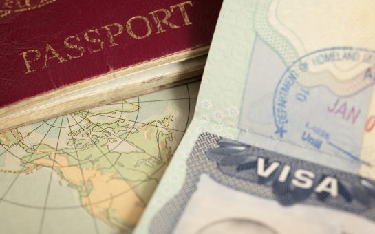 "US visa, vintage map and passport background"