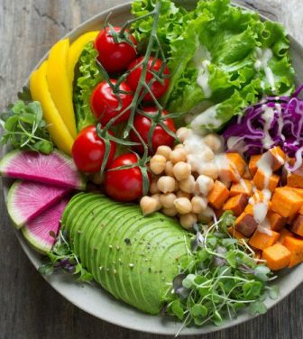 A salad filled with a mix of plants.