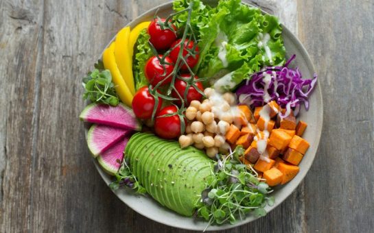 A salad filled with a mix of plants.