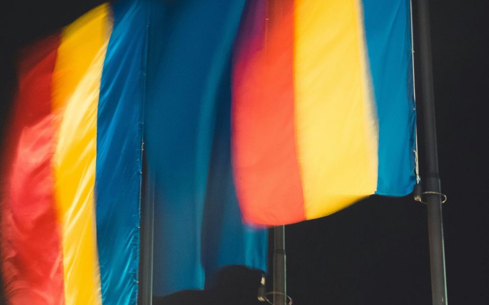 Romania flags (Credit: Free to use from Unsplash)