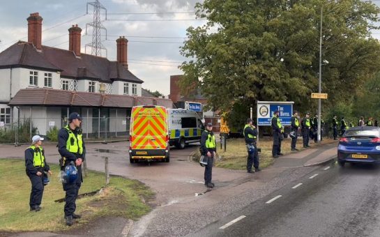 Police officers stationed outside Epping hotel