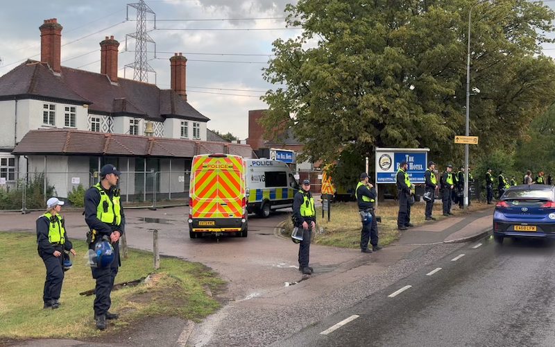 Police officers stationed outside Epping hotel