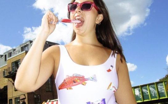 Model licking an ice lolly whilst wearing the Rubbish Collection.