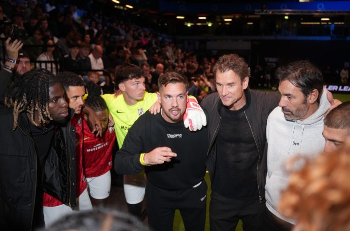 Pires, Lehmann and Eman huddle round with their players