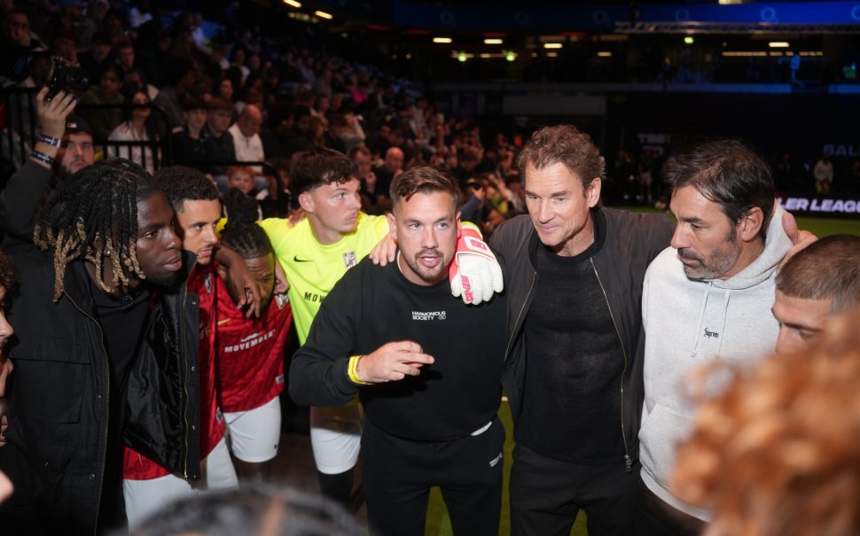 Pires, Lehmann and Eman huddle round with their players