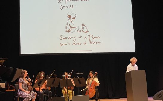 Charlie Mackesy on stage at the Barbican with Isobel Waller-Bridge and her quartet