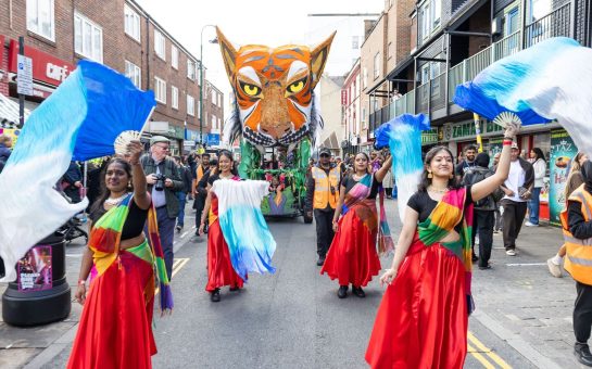 Dancers and a flot at the Brick Lane Curry Festival.