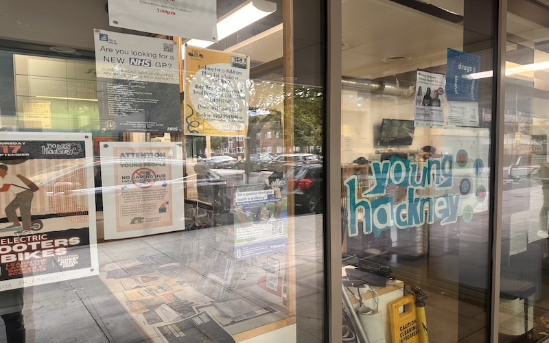 A youth hub window with lots of community information.