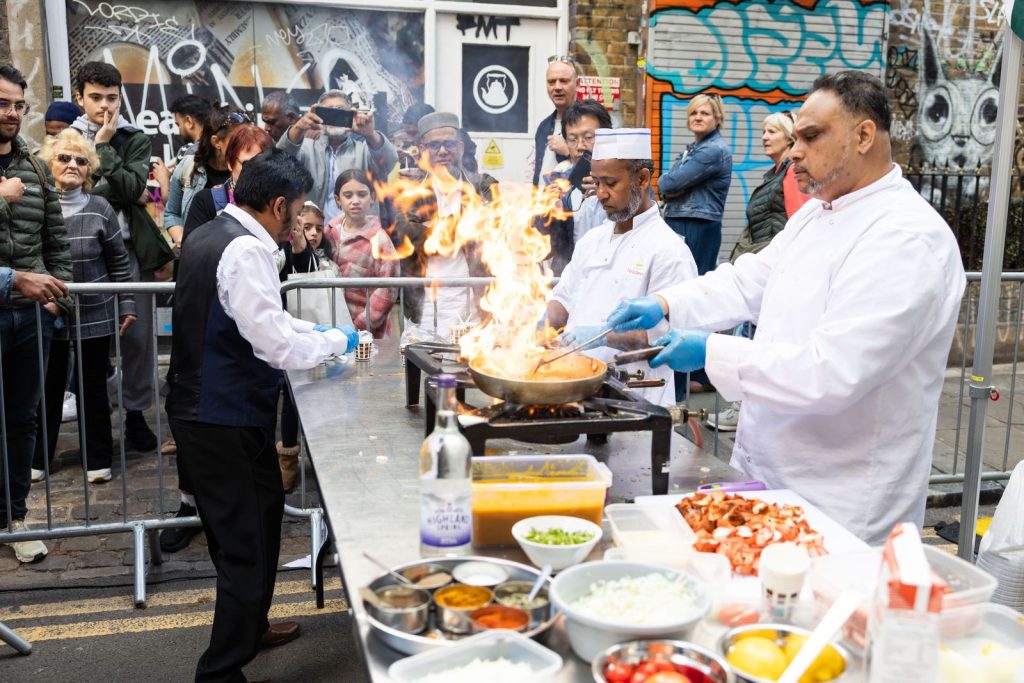 Chefs cooking on Brick Lane