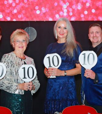 The four judges of Strictly St Francis 2025 pose with their scoring panels, all showing 10