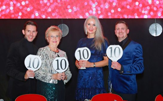The four judges of Strictly St Francis 2025 pose with their scoring panels, all showing 10